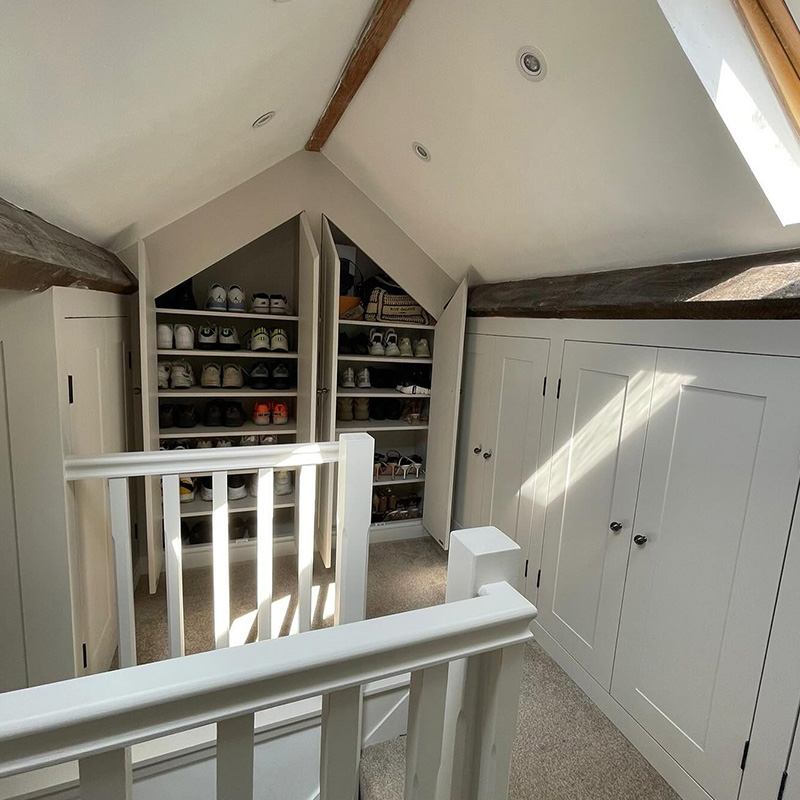 Loft cupboards, with open shoe cupboard