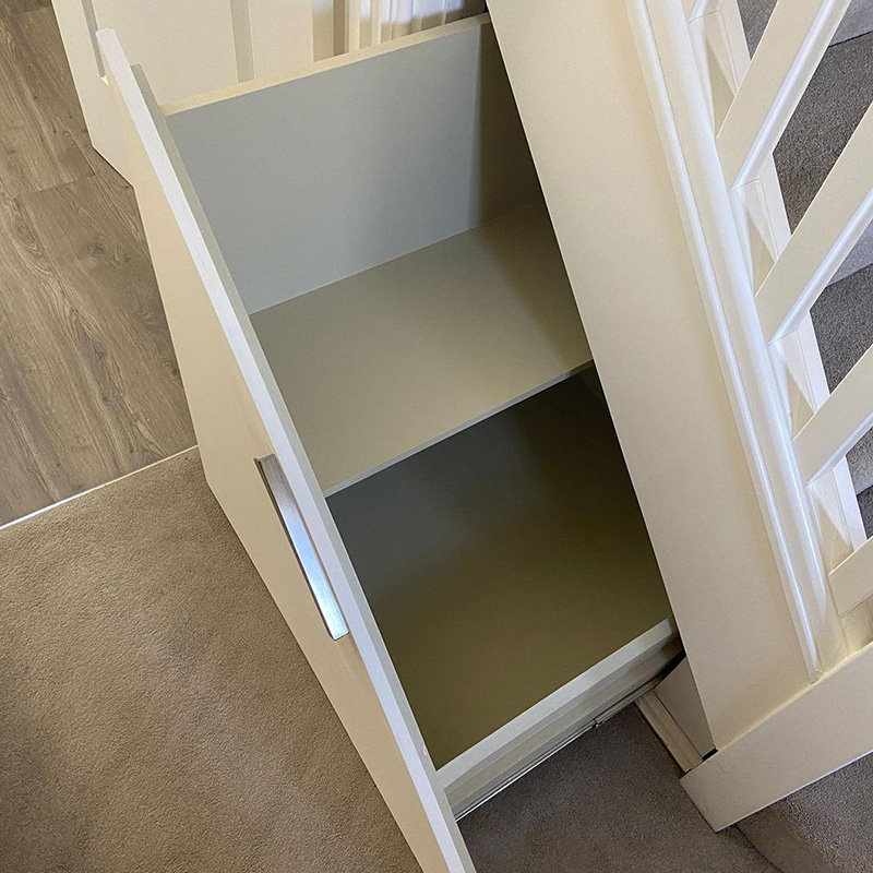 under stairs drawers in open position